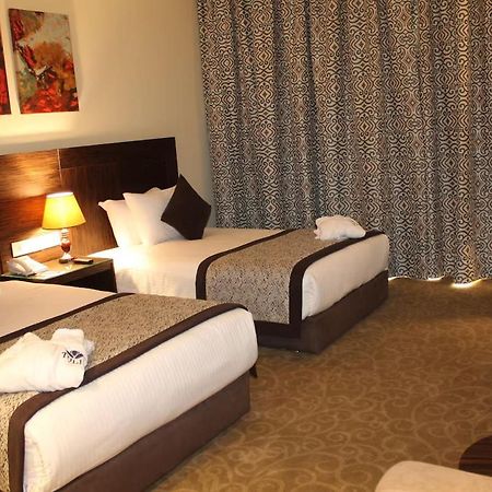 Tolip El Forsan Hotel İsmailiye Dış mekan fotoğraf A room at the hotel